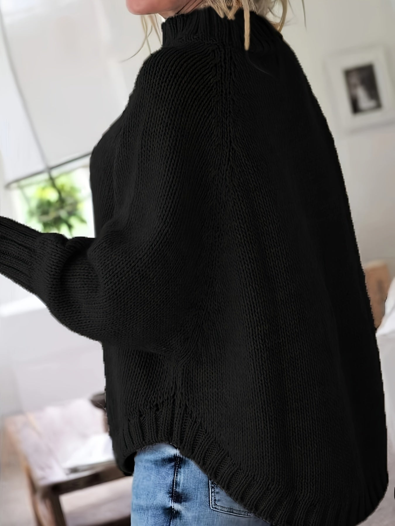 Trui zwart mockneck detail shot