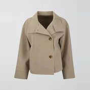 Beige short coat with buttons hanging view
