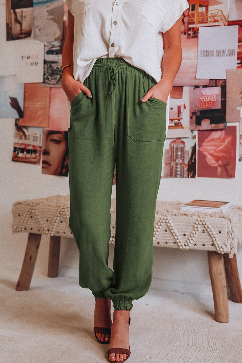 Women's green linen pants front view