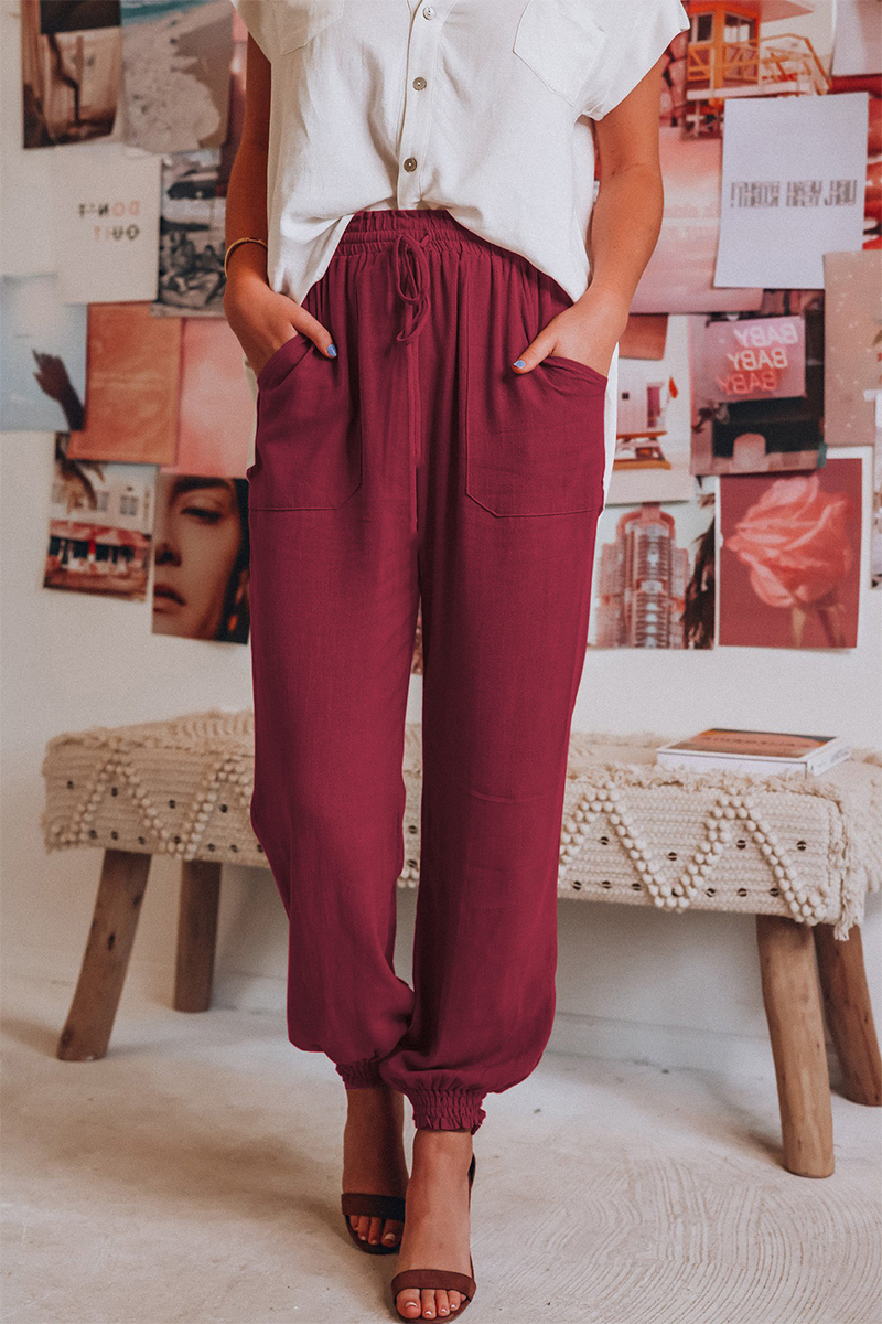 Women's burgundy linen pants side view