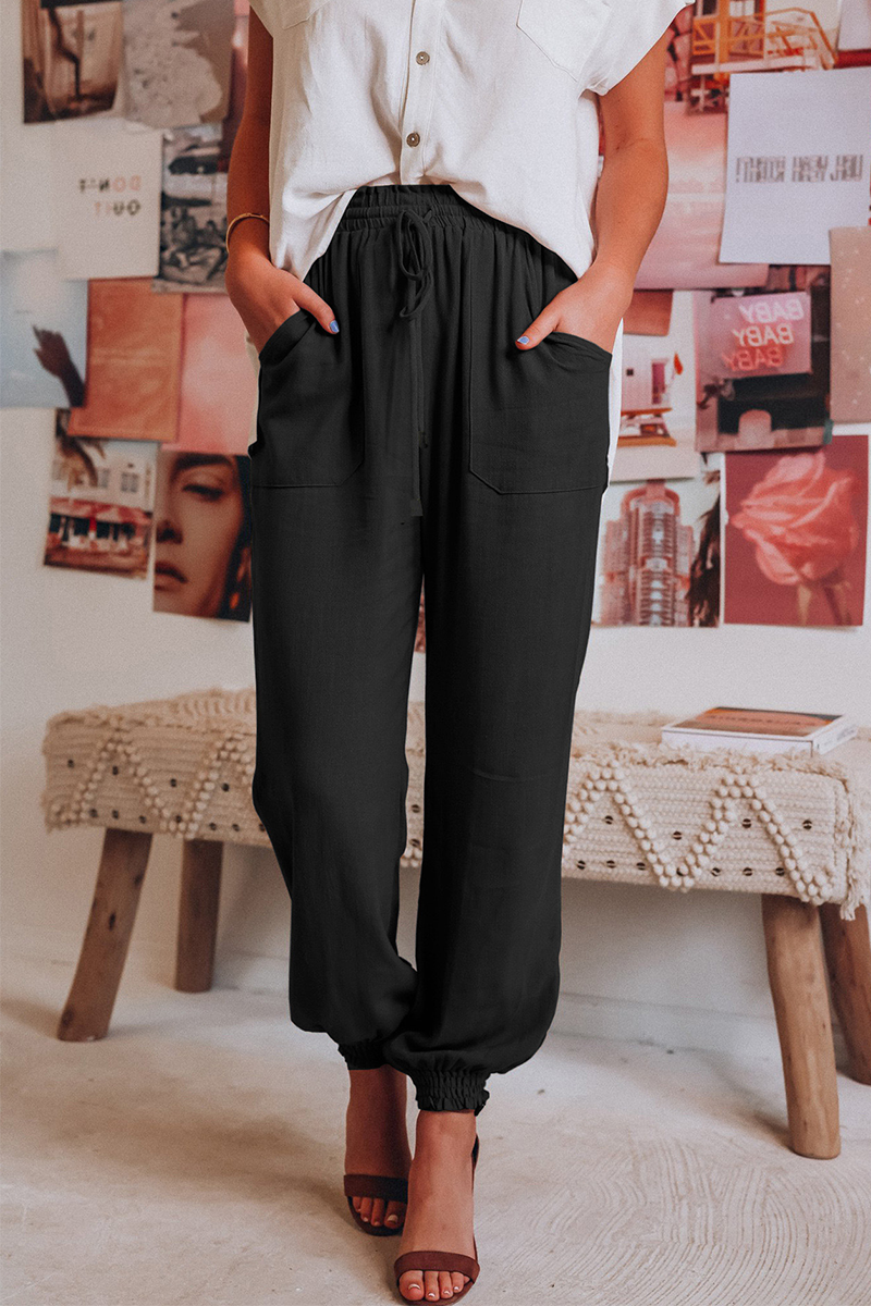 Women's black linen pants close-up