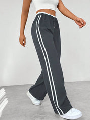 Vrouwen wide-leg broek donkergrijs met witte strepen zijprofiel
