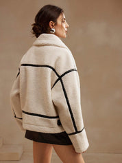 Cream fleece jacket with black trim side detail