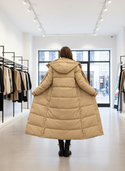 Lange Pufferjas met Capuchon: Stijlvolle Warmte voor de Winter