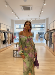 Maxi dress with floral print and off-shoulder bow, front view