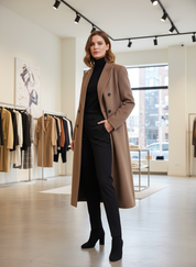 Tan wool blend overcoat front view with black turtleneck and trousers