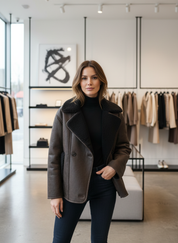 Brown teddy-lined coat front view with black pants