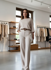 Beige blouse and pants set front view with accessories