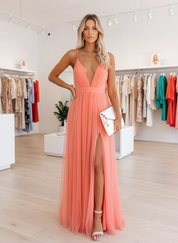 Coral tulle evening dress front pose in store