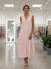Pink tiered summer dress front view in store