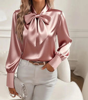 De Elegante Strikblouse: Jouw Sleutel tot Tijdloze Stijl