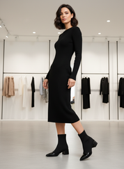 Black ribbed knit dress with ankle boots side view