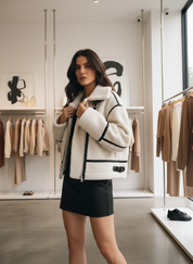 Cream fleece jacket with black trim front view