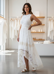 White boho maxi dress with lace and geometric patterns indoor side view