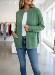 Green knit cardigan with pockets side view