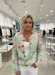 Cardigan light green and pink floral pattern front view