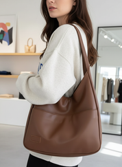 Brown slouchy hobo bag side view