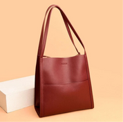 Red tote bag with textured leather front view