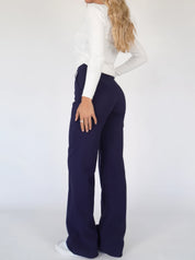 Hoge-waist broek donkerblauw recht model zijprofiel