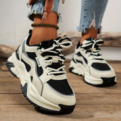 White and black chunky sneakers with mesh detail side view