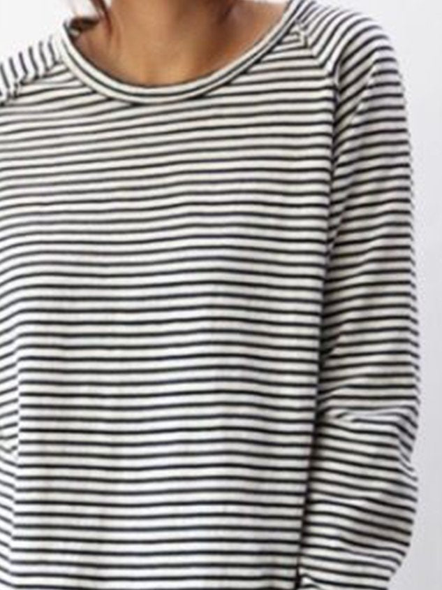 Black and white striped long-sleeve shirt close-up neck view
