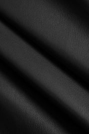 Faux leather trench coat black close-up texture