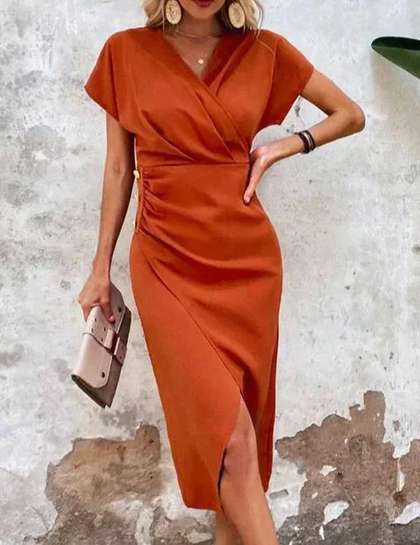 Midi dress orange with V-neck and side slit side profile