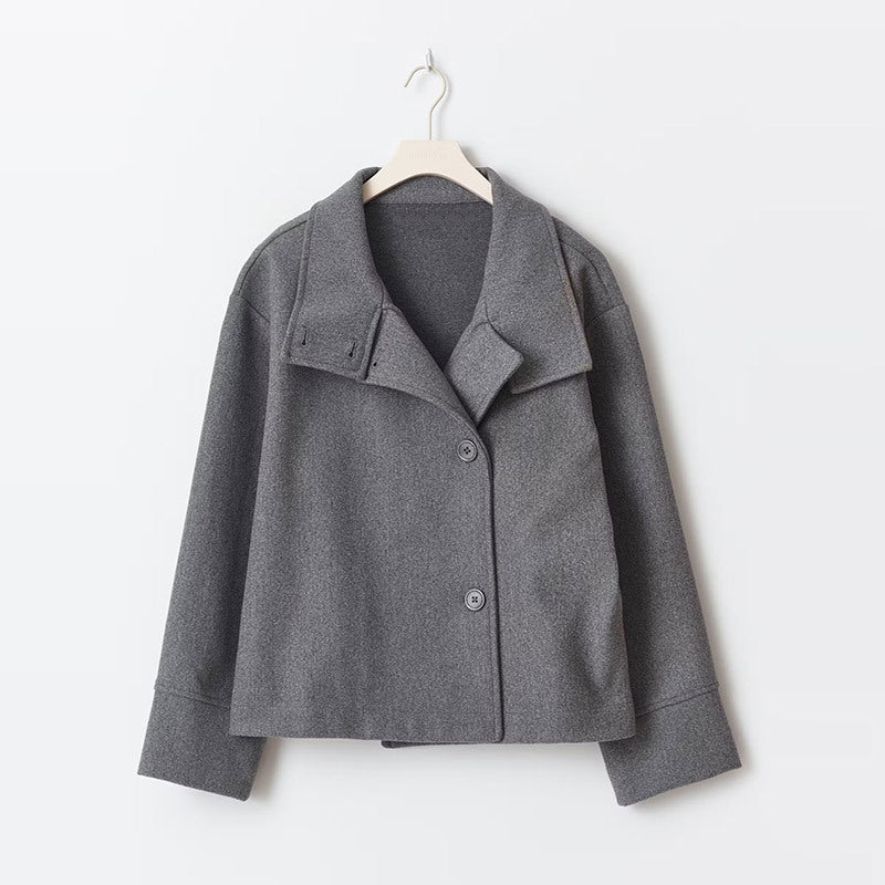 Gray short coat with buttons hanging view