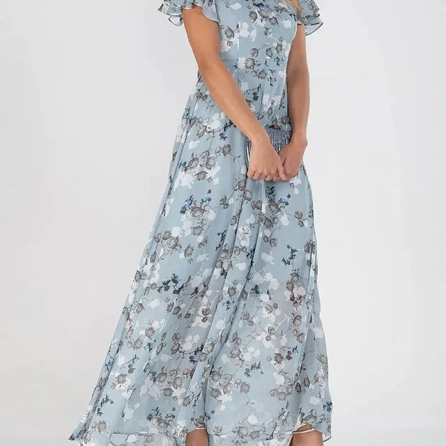 Lange jurk met bloemenprint in blauw en zilver, vooruitkijkend