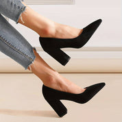 Black suede pumps pointed toe side view