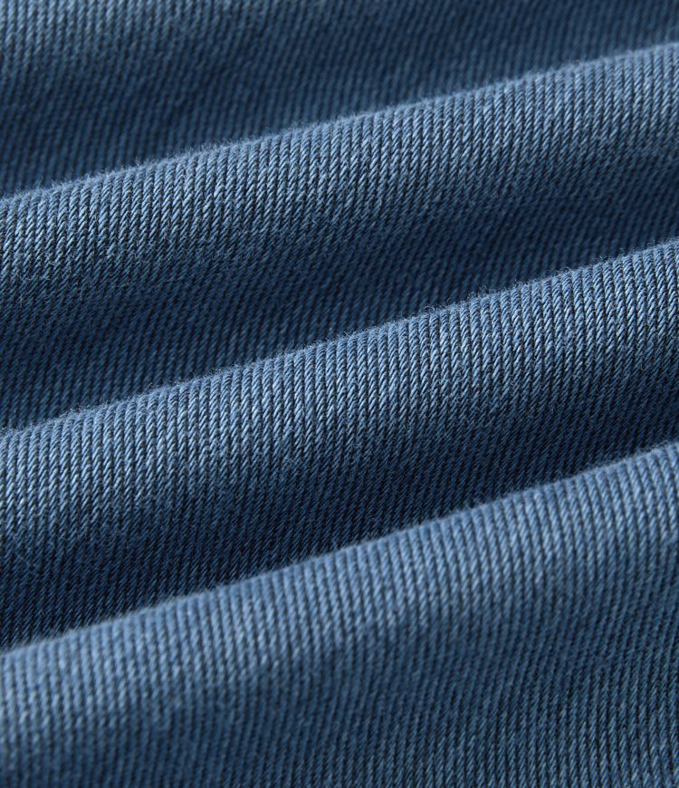 Wide-leg denim pants dark blue fabric texture close-up