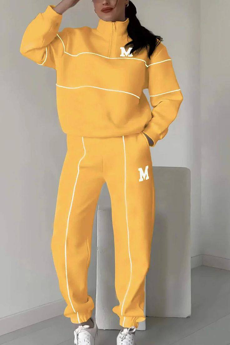 Yellow half-zip tracksuit with white stripes front view