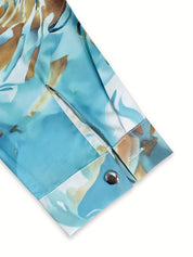 Silk blouse with abstract marbled print, close-up of cuff
