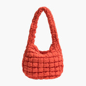Quilted hobo bag coral front view