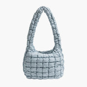 Quilted hobo bag light blue front view
