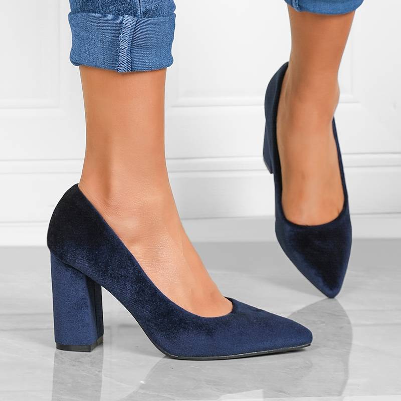 Navy suede pumps pointed toe side view