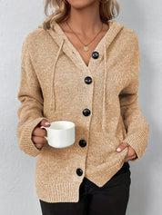 Beige knit cardigan with buttons and white top front view
