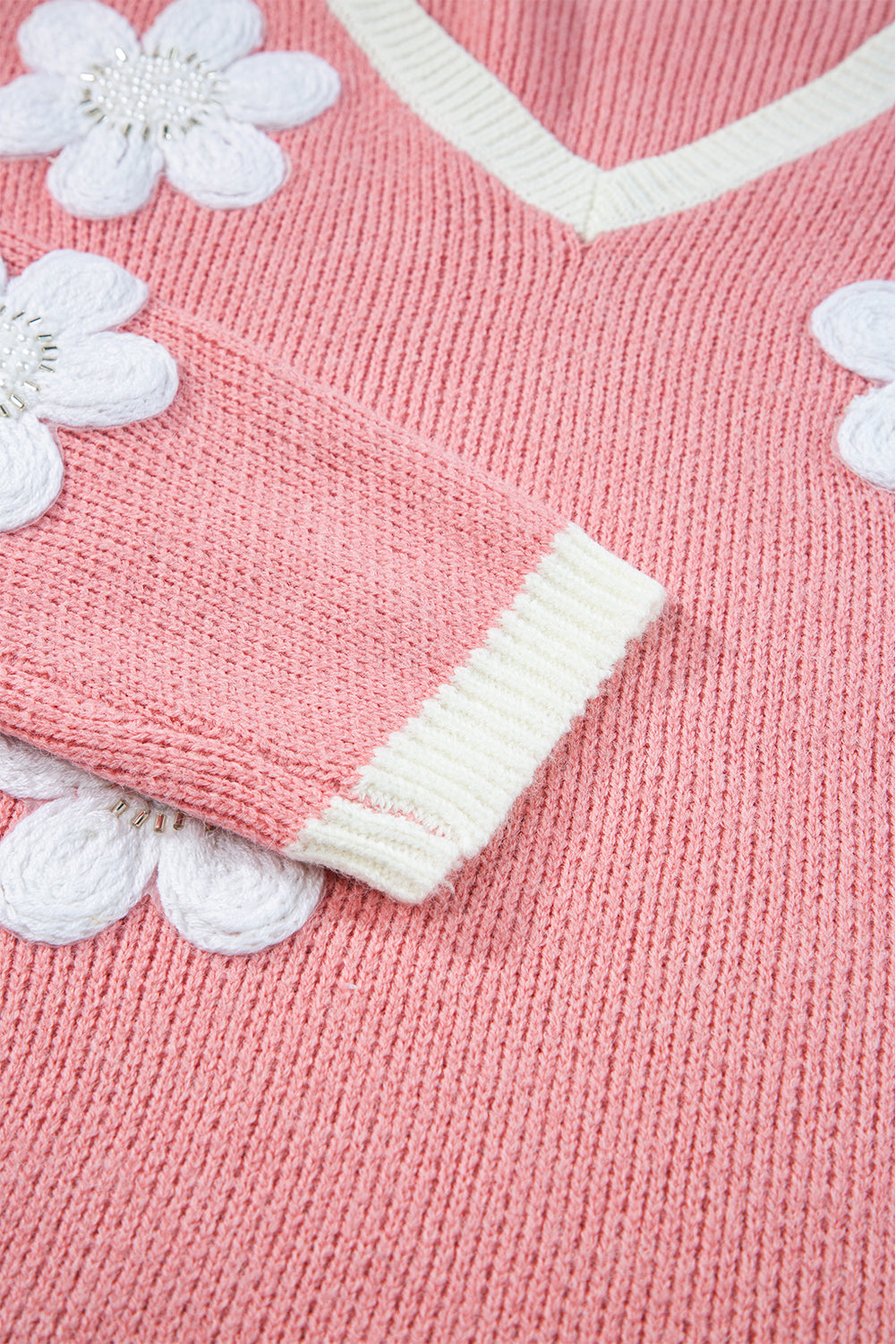 Trui roze met witte bloemen detail