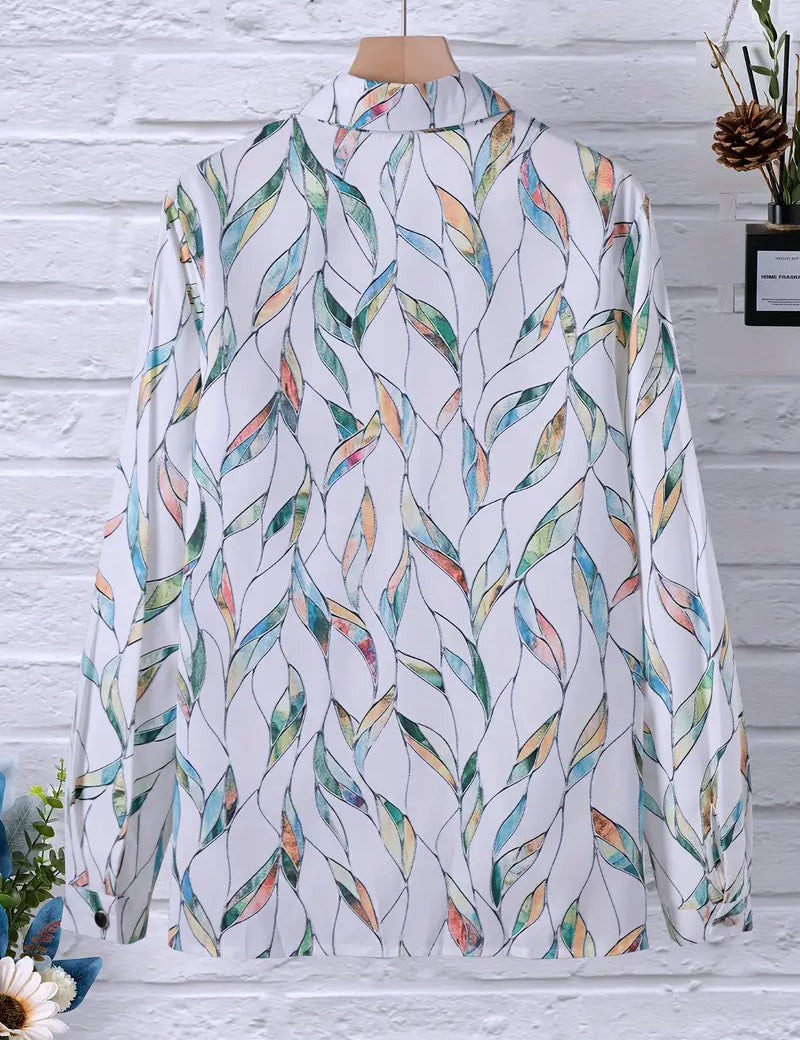 Blouse with leaf print and white background, front view on mannequin