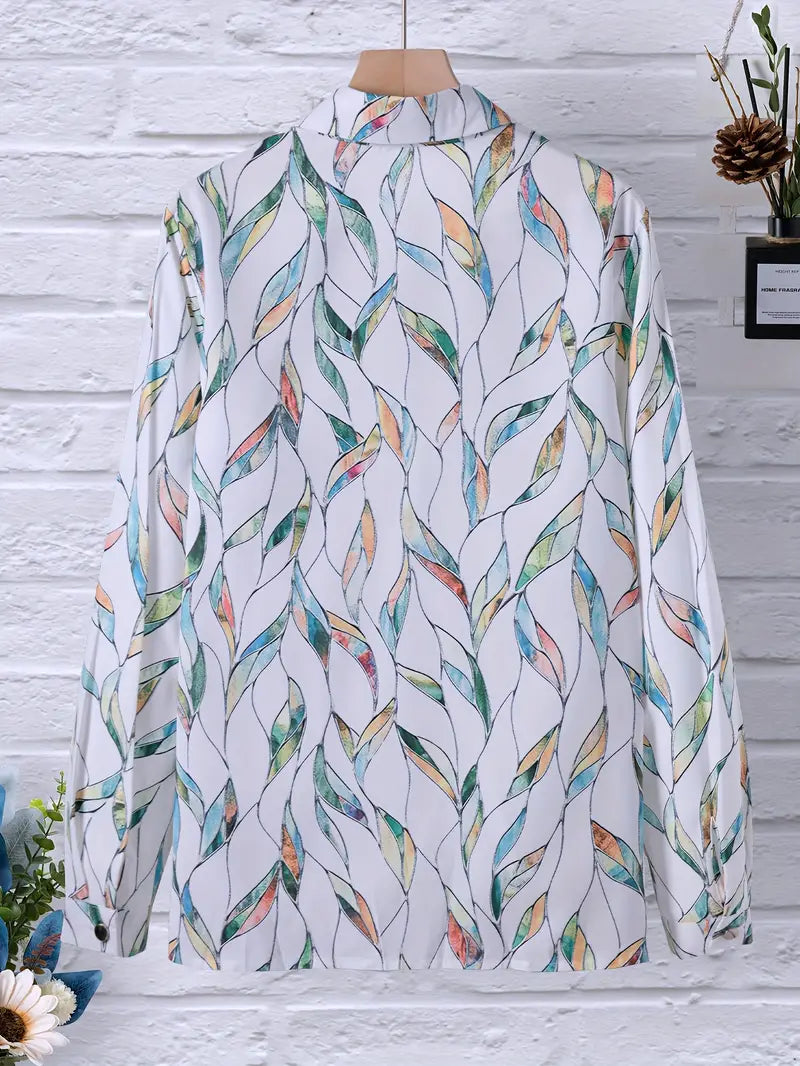 Blouse with leaf print and white background, front view on mannequin