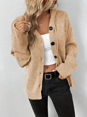 Beige knit cardigan with buttons and white top front view