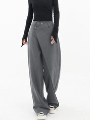 Grijze oversized pantalon met dubbele knoop detail front view