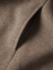 Winterjas beige geborsteld stof detail schot