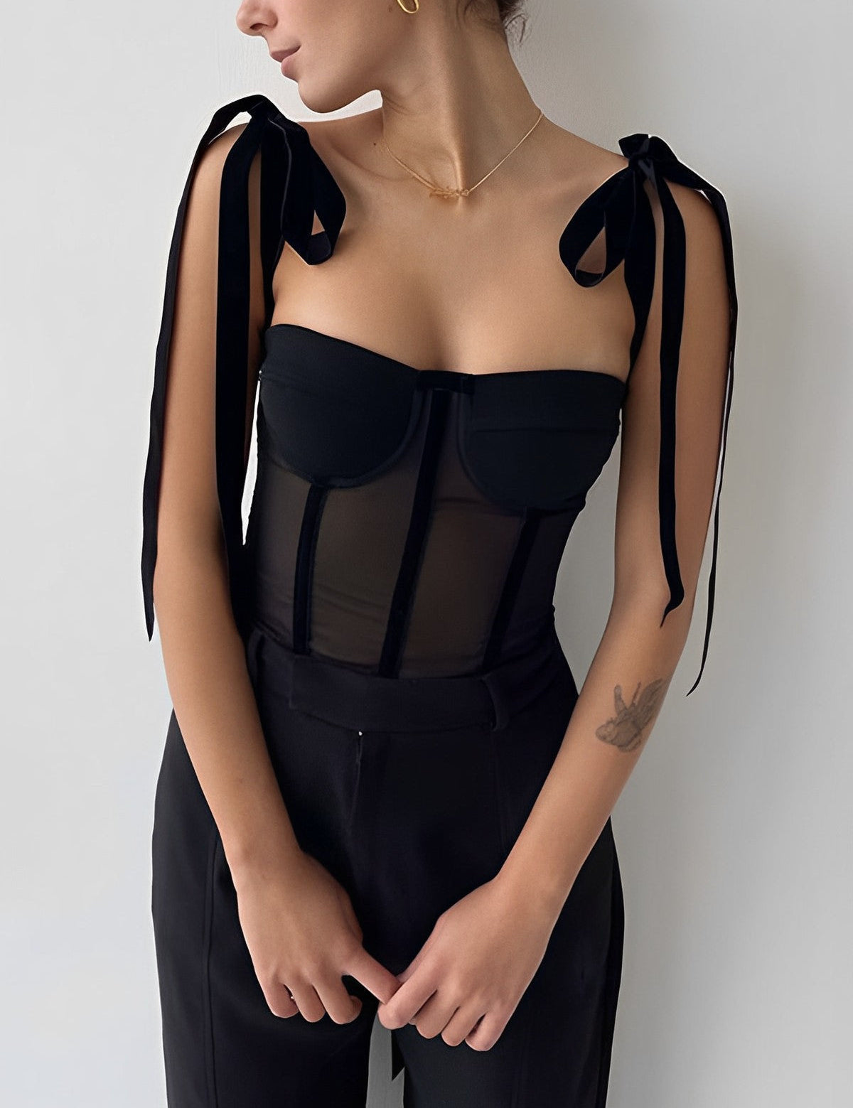 Black mesh bustier top with velvet straps, front view