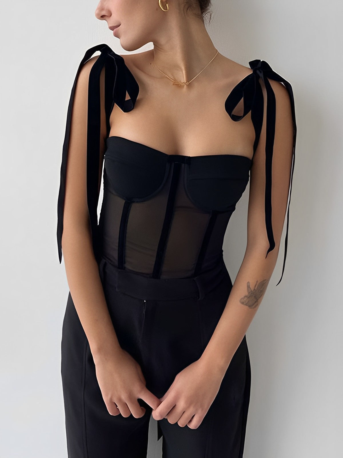 Black mesh bustier top with velvet straps, front view