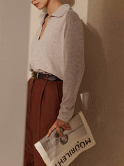Soft cashmere blend polo shirt with deep V-neck, side detail