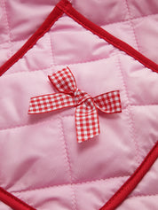 Jas roze met rode ruitjes strik detail