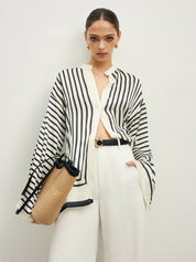 Striped blouse with band collar and white pants front view