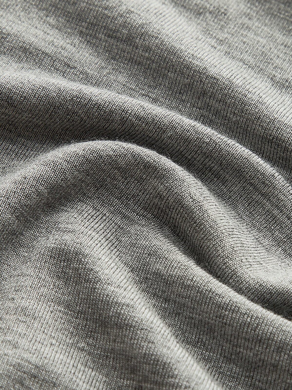 Grijs trui met geplooide mouwen detail shot