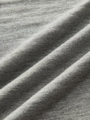 Dames trui met geplooide mouwen grijze stof detailopname